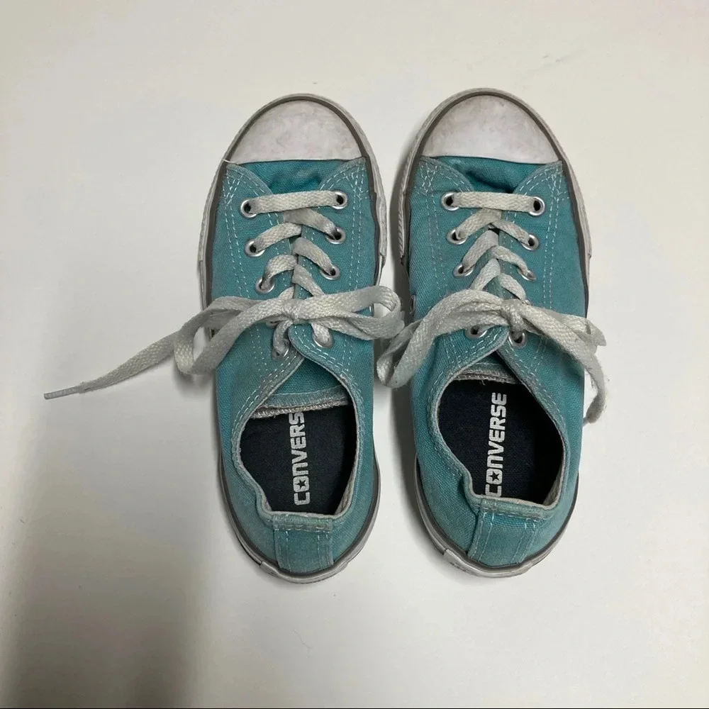 Kids size 13 teal Converse. In play condition
